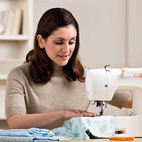 Woman Using Sewing Machine